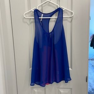 Sleeveless sheet blue and pink top. Looks amazing with denim.